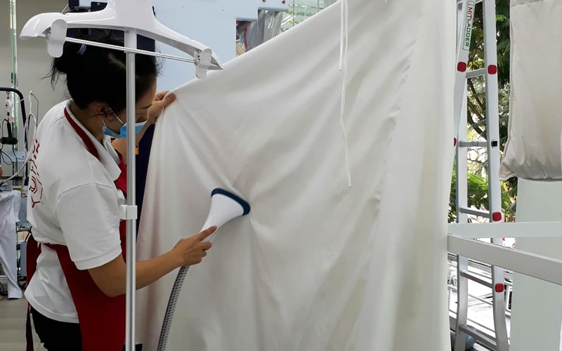 chi phí mở tiệm giặt là